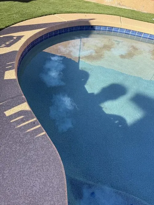 Pool chemical treatment in progress